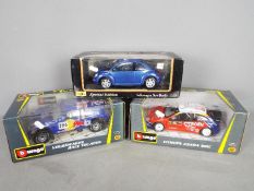 Bburago - Maisto - A lot of Three boxed 1:18 scale cars including VW Race Touareg,