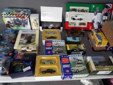 Corgi - Lledo - Solido - A collection of over 20 boxed diecast cars in various scales and also