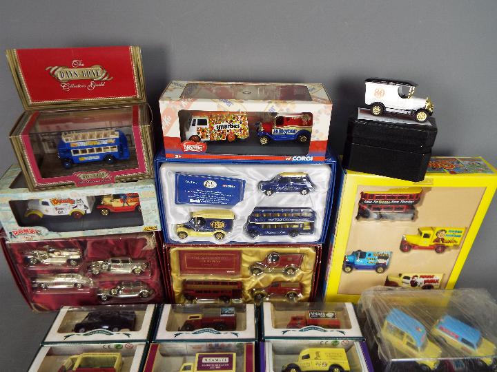 Lledo - Corgi - Oxford - A collection of 28 boxed vehicles in 1:43 and 1:76 scales including # QM - Image 2 of 3