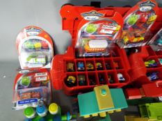 Chuggington - A collection of Chuggington diecast models and play accessories including 2 full