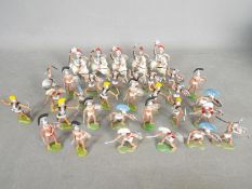 Herald, Britains - A group of over 30 unboxed Herald Trojan plastic figures.