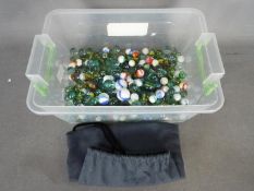 Marbles - A quantity of vintage glass marbles, in excess of 200 including clear,