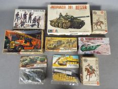 Airfix, Revell - Five boxed / packeted plastic model kits in various scales.