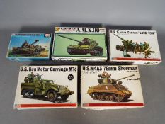 Five model kits including two Bandai WWII U.S. Armoured Division Pin Point series.