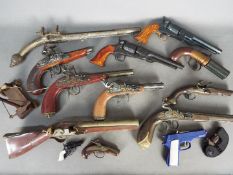 Lindberg, Pyro, King, Lone Star Others - A cache of built plastic model guns,