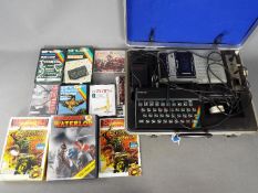 Sinclair, Psion, Activision, Others - A Sinclair ZX Spectrum with power supply,