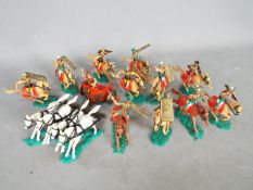 Timpo - A brigade of 12 unboxed plastic Timpo Roman mounted soldiers, in a variety of action poses,