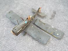 An unbranded / unmarked Radio Controlled model Biplane.