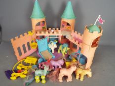 Hasbro - My Little Pony - Vintage 1984 Hasbro My Little Pony Dream Castle with some accessories and