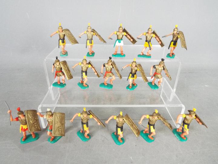 Timpo - A cohort of 16 unboxed plastic Timpo Roman foot soldiers, in a variety of action poses.