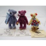 Small Bears For A Big World - Becky Wheeler bear with dog on a lead named Sweety Pie in Mint
