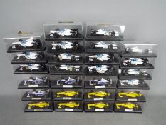 Onyx - 26 boxed diecast F1 racing cars by Onyx.