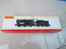 Hornby - an OO gauge class QI locomotive and tender, 0-6-0 BR black livery, weathered edition,