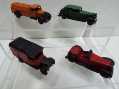 Dinky - A collection of 4 1940s Dinky vehicles including # 25d petrol tanker,