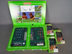 Subbuteo - A boxed Subbuteo table Football set with three extra Subbuteo lightweight teams.