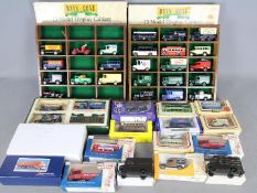 Lledo - Matchbox - Vitesse - A collection of 2 boxed wooden Days Gone display cabinets and over 30