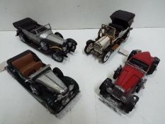 Franklin Mint - Four unboxed 1:24 scale diecast model vehicles from Franklin Mint.