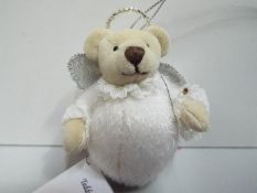 Janis Presbury / Waldron - Silver Angel Teddy Bear. Label. high 9cm.