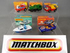 Matchbox - Five boxed Matchbox Superfast diecast vehicles.