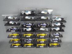 Onyx - 26 boxed diecast F1 racing cars by Onyx.