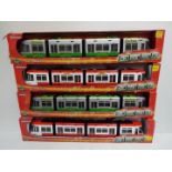 Majorette - A collection of 4 boxed large scale Majorette City Liner trams,