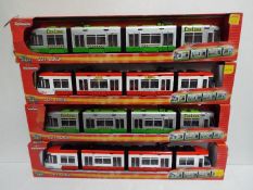 Majorette - A collection of 4 boxed large scale Majorette City Liner trams,