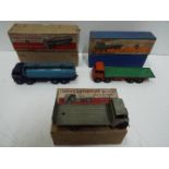 Dinky - A group of 3 boxed 1950s Dinky lorries including # 502 Foden flat truck,