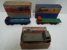 Dinky - A group of 3 boxed 1950s Dinky lorries including # 502 Foden flat truck,