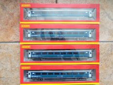 Hornby - four items of OO gauge Arriva Mark 3 standard open coach rolling stock comprising two off