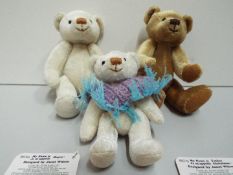 Gund - Three Teddy Bears. Jointed. Four paper label's included. 12cm High.