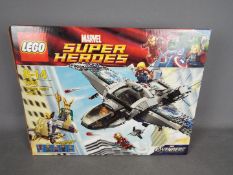 LEGO - a Lego Marvel 6869 Super Heroes Quinjet Aerial Battle factory sealed.