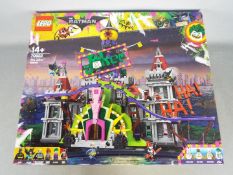 LEGO - Boxed Lego Batman Movie series set # 70922 The Jokers Castle in opened box with parts in zip