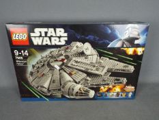 LEGO - a Lego 7965 Star Wars Millennium Falcon ,Construction set. Factory sealed.
