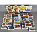 Lledo, Oxford Diecast, Corgi - A collection of approximately 60 boxed diecast vehicles .