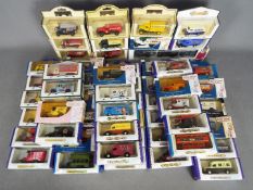 Lledo, Oxford Diecast, Corgi - A collection of approximately 60 boxed diecast vehicles .