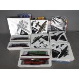 Atlas Editions - Nine boxed Atlas Editions diecast model aircraft and static model trains.