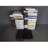 Sony Playstation - An unboxed Sony Playstation 2 games console with a collection of over 40 Sony