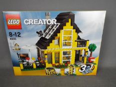 LEGO 4996 - a Lego Creator 3 in 1 Beach House Construction set, factory sealed.
