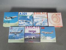 Dragon Wings - A collection of seven boxed diecast model aircraft in 1:400 scale by Dragon Wings.