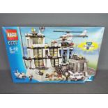 LEGO - 7237 - a Lego City Police Station Construction set in open box.