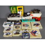 Matchbox, Corgi, Atlas Editions, Others - A grouping of boxed diecast vehicles in various scales.