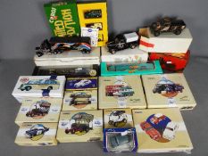 Matchbox, Corgi, Atlas Editions, Others - A grouping of boxed diecast vehicles in various scales.