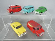 Corgi Toys - Five unboxed diecast vehicles by Corgi Toys all featuring flywheel motor.