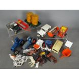 Britains - An unboxed collection of farm vehicles and implements by Britains.