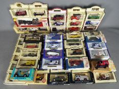 Lledo - A collection of 60 boxed diecast vehicles.