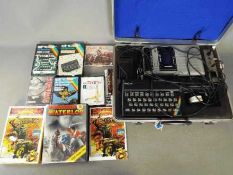 Sinclair, Psion, Activision, Others - A Sinclair ZX Spectrum with power supply,