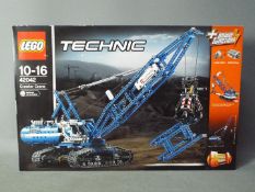 LEGO - A boxed Lego Technic powered Crawler Crane # 42042,