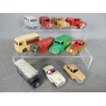 Dinky Toys, Corgi Toys, Kemlow - An unboxed grouping of 11 diecast vehicles.