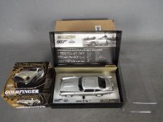 Scalextric - Goldfinger Aston Martin DB5 50th anniversary limited edition slot car.