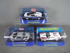 Scalextric - Ferrari 308 GTB, 2 x Bugatti Veyron slot cars.